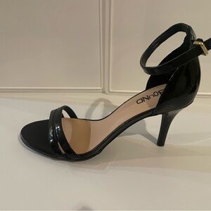 Black heels size 7 1/2. Only worn once.